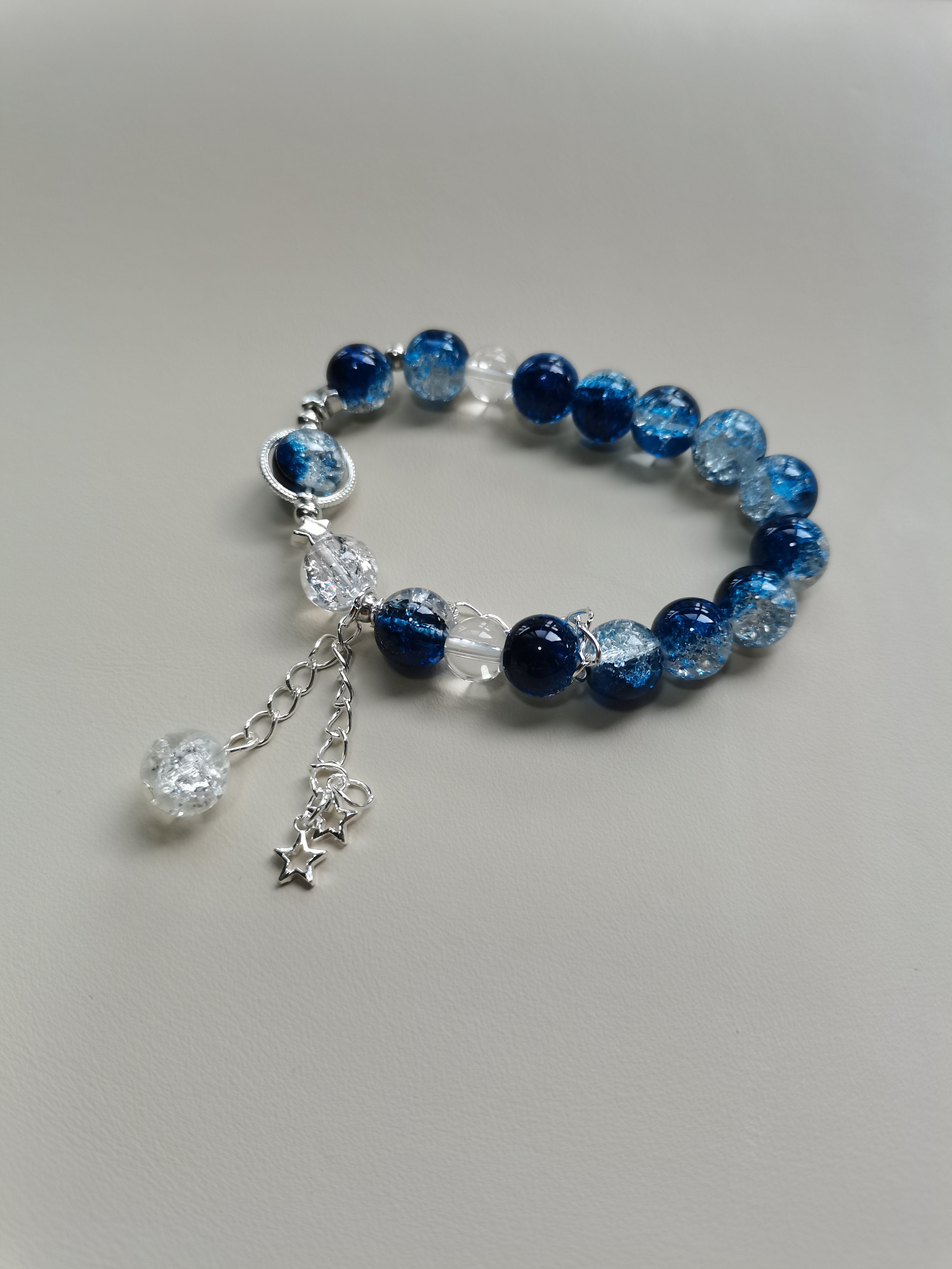 Glittery Blue & Clear Bead Bracelet with Dangling Stars