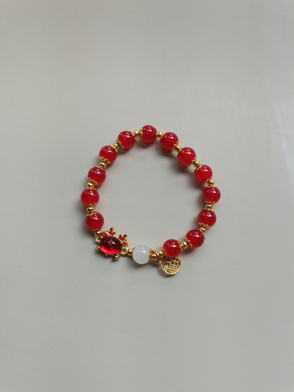 Lucky Red Bead Bracelet with Gold Plated 'Fu' Charms