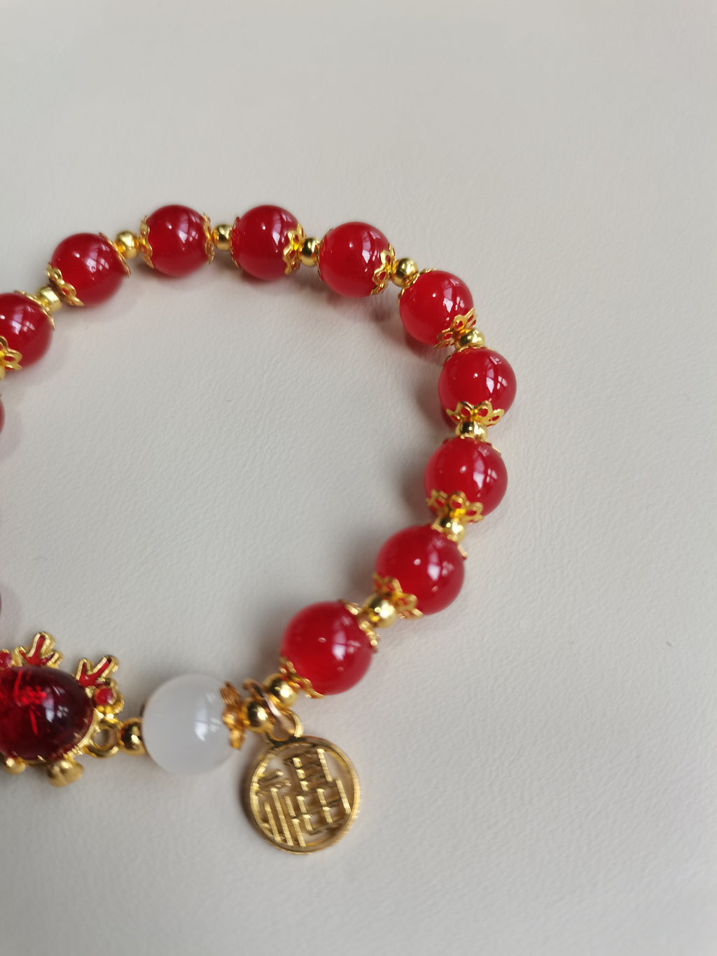 Lucky Red Bead Bracelet with Gold Plated 'Fu' Charms