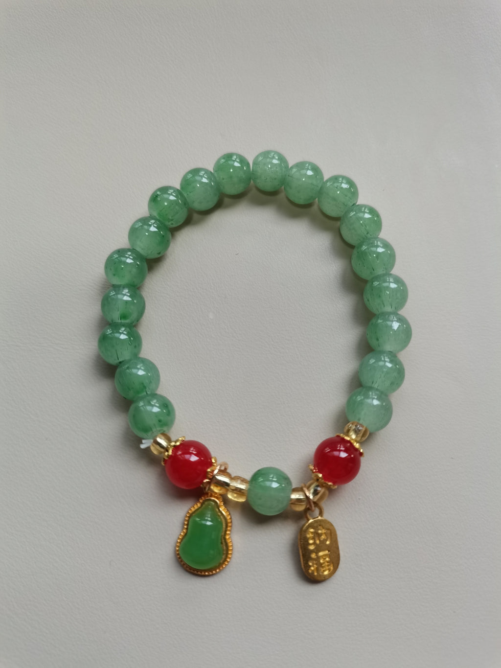 Green Beaded Bracelet with Gourd and 'Fu' Charm