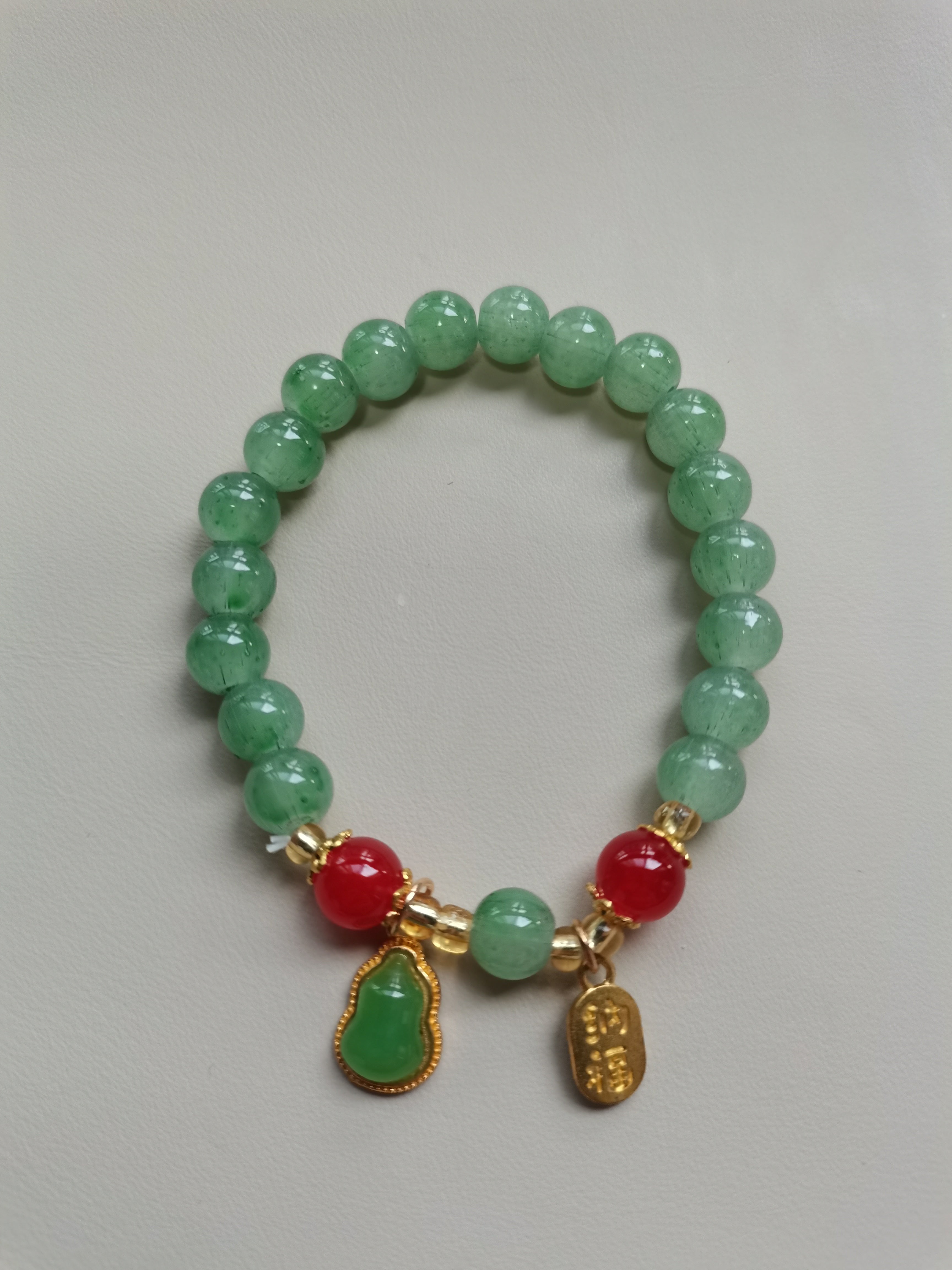 Green Beaded Bracelet with Gourd and 'Fu' Charm