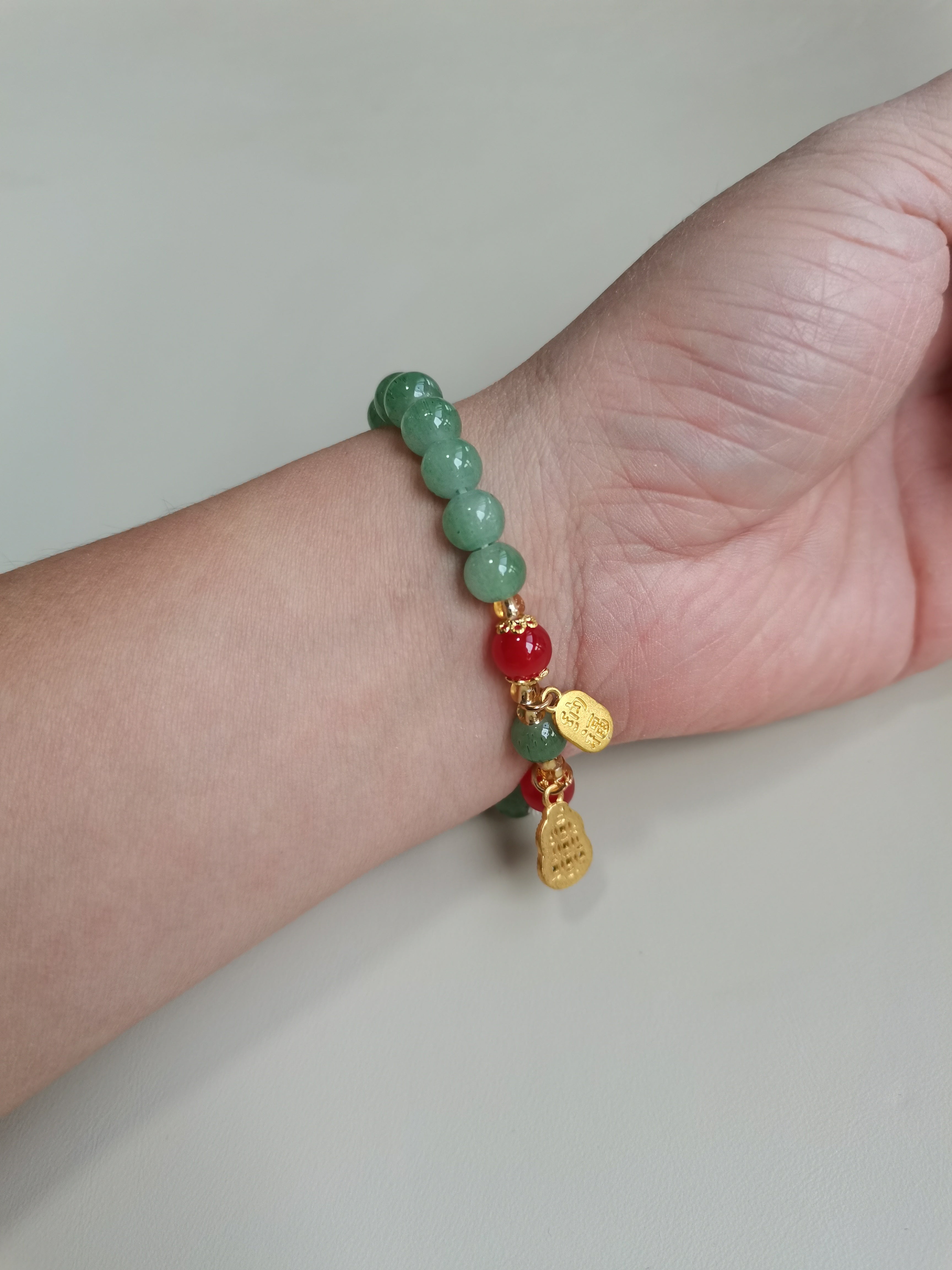Green Beaded Bracelet with Gourd and 'Fu' Charm